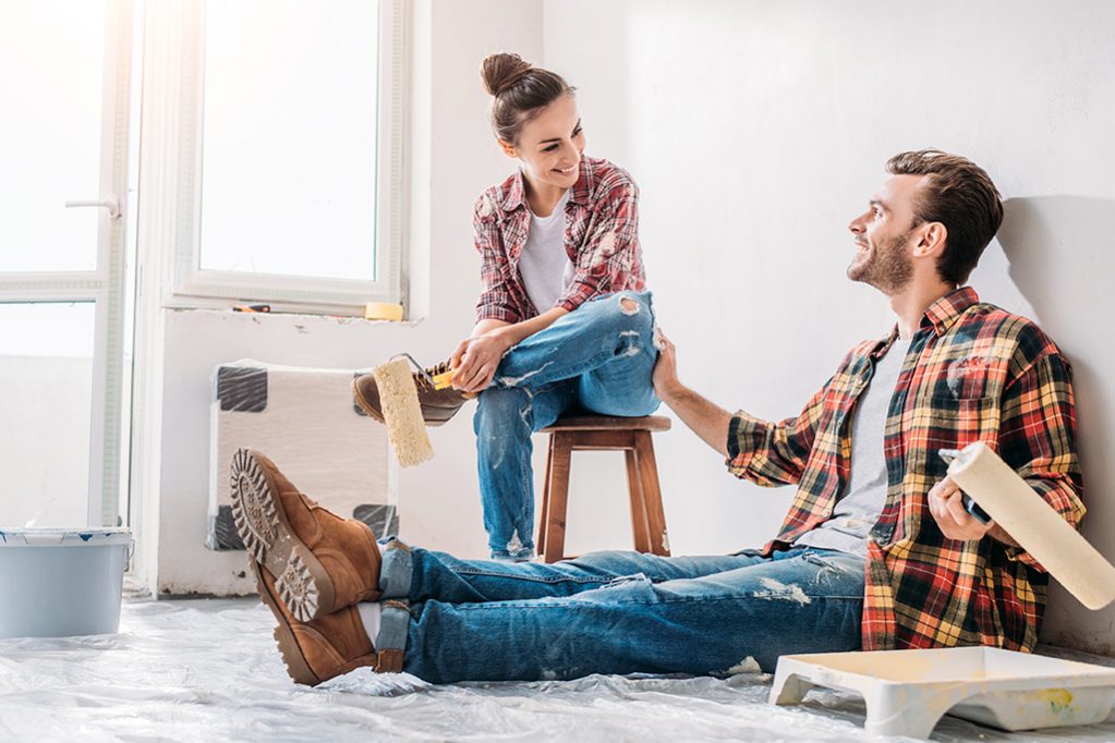 Avoid These 7 DIY Home Improvement Mistakes – Tips for Sellers and Homeowners Homeowners fixing a DIY project gone wrong, embodying the challenges and solutions in home improvement.
