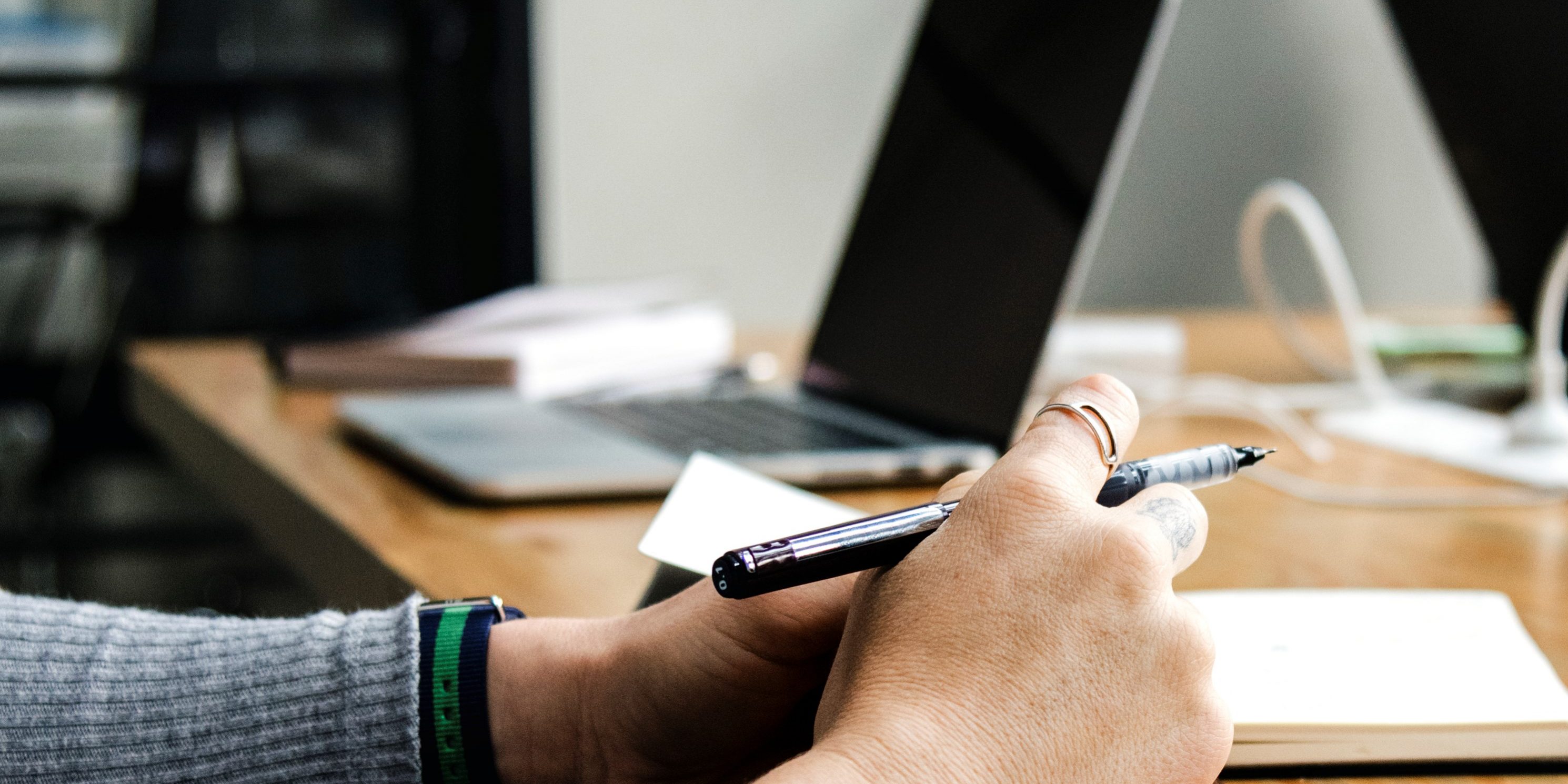 Woman writining in a notebook